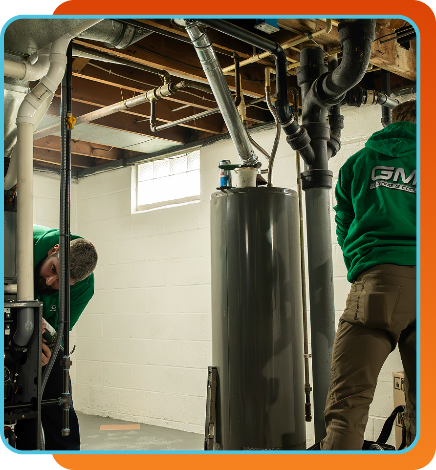 two technicians working on outdoor AC Units