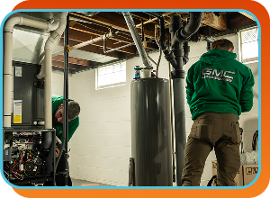 two technicians working on outdoor AC Units